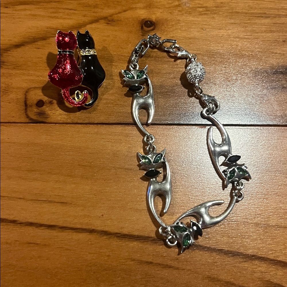 Silver Cat Bracelet with Green and Black Accents